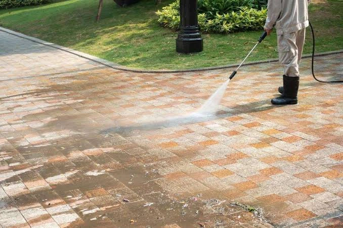 what to spray on concrete before pressure washing