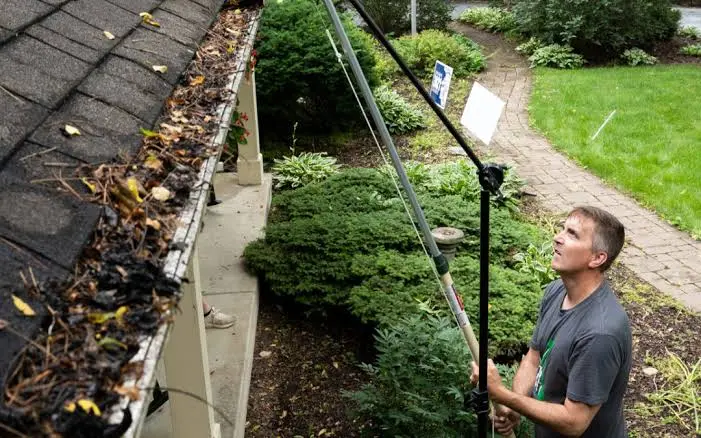 how to clean gutters from the ground